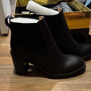 Christian louboutin women’s boots 9.5 rubber bottoms